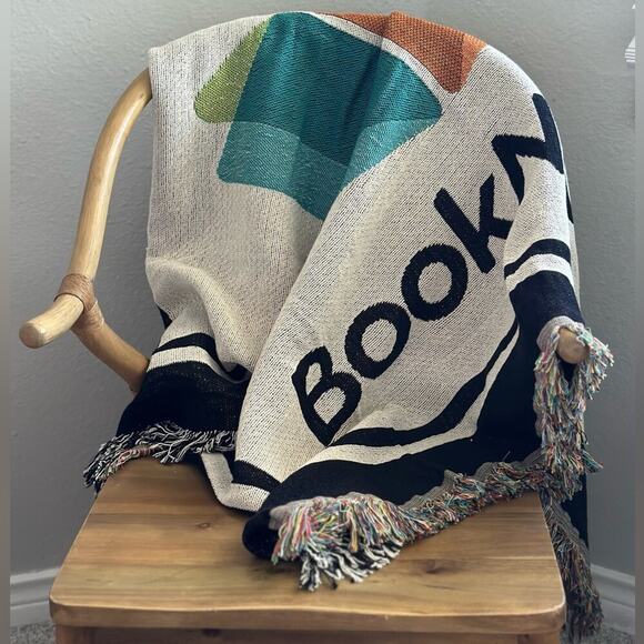 BookNook multicolor knit with fringe reading blanket with book logo - Picture 1 of 4